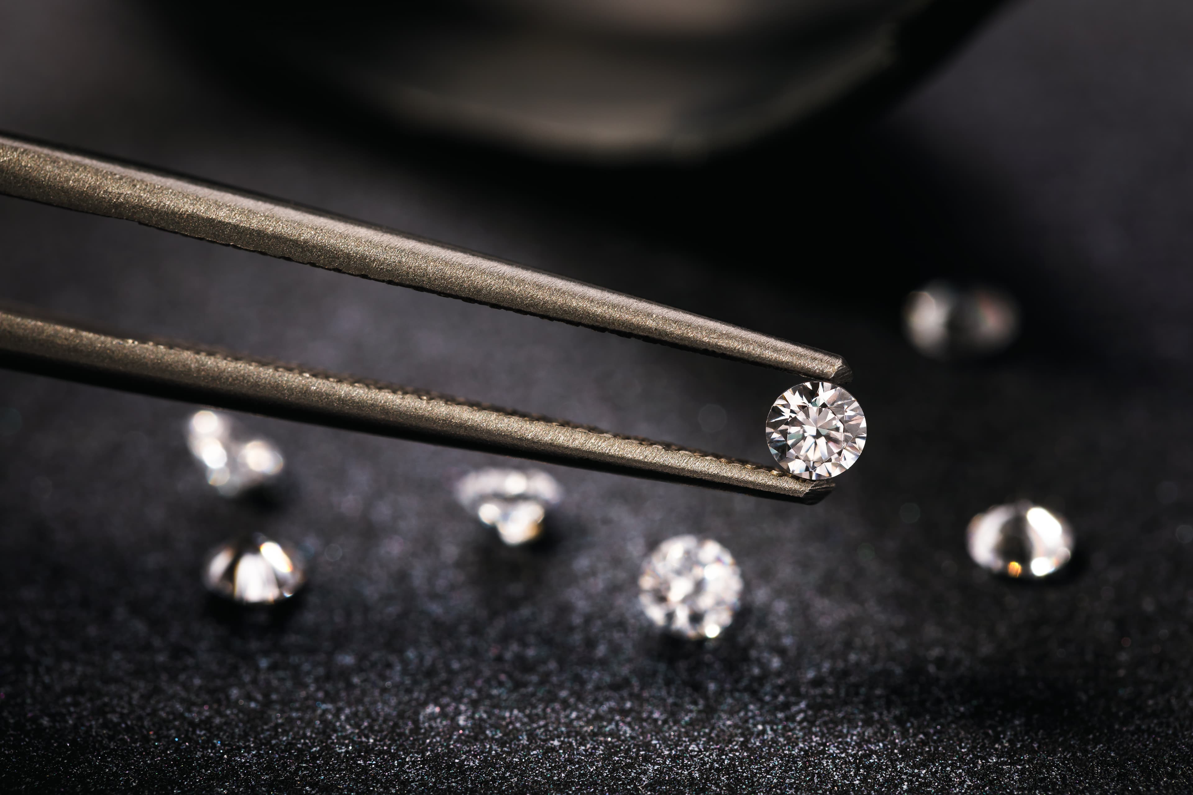 A single emerald-cut diamond showing its step-cut facets