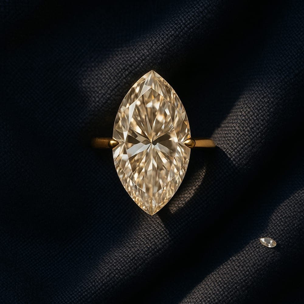 Top-down view of a loose moval diamond showing its soft-cornered elongated outline